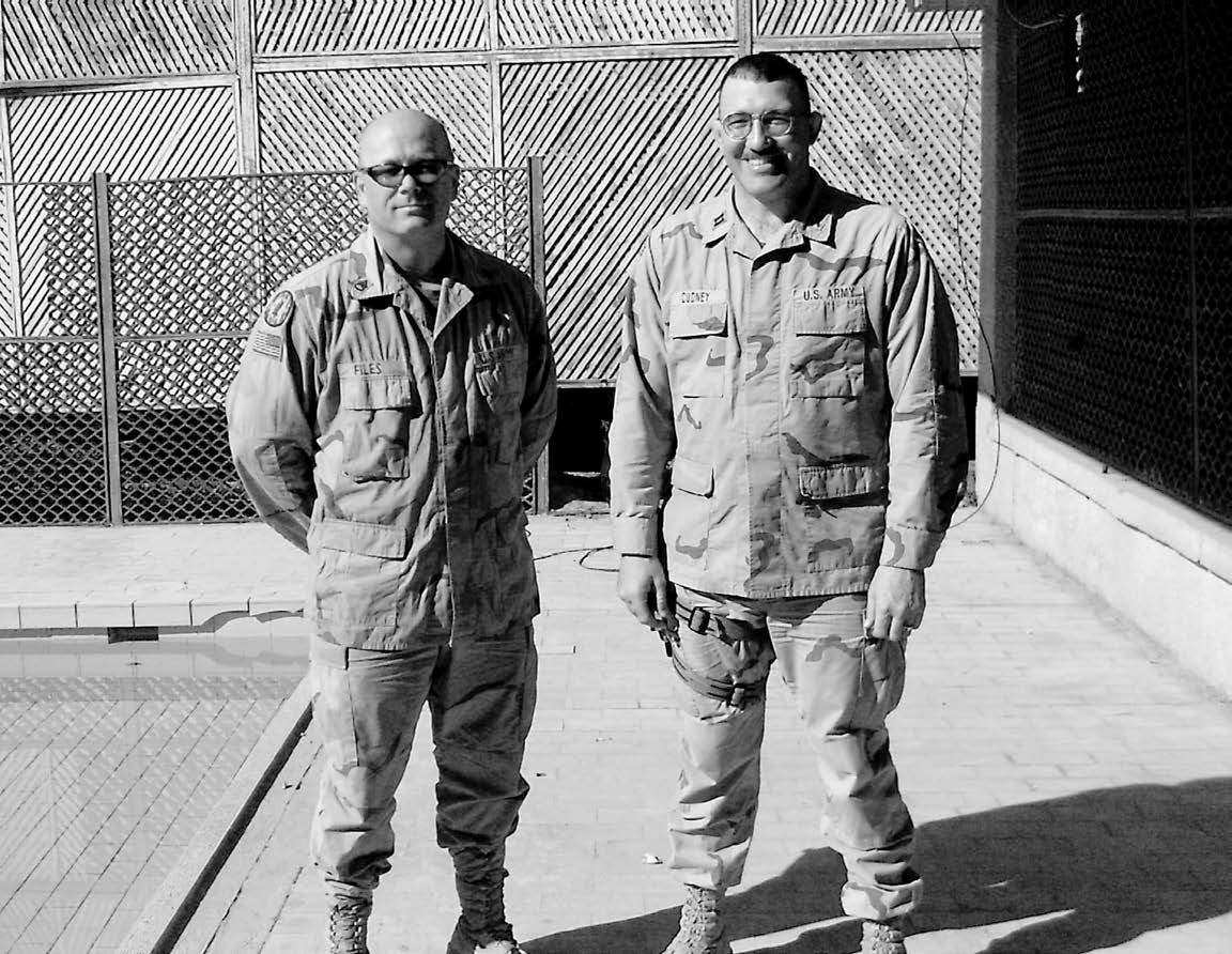 Staff Sergeant Files (left) was baptized by Captain Cudney (right). Courtesy of Bryan Blair.