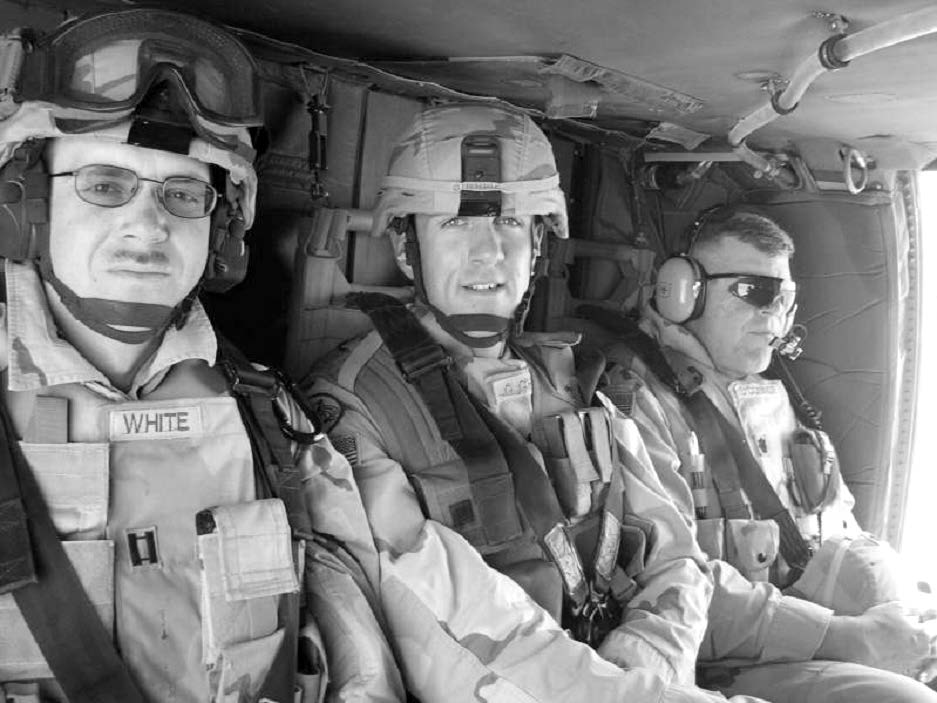 Army officers on a flight to Mosul, Iraq. Courtesy of Steve Gundry.