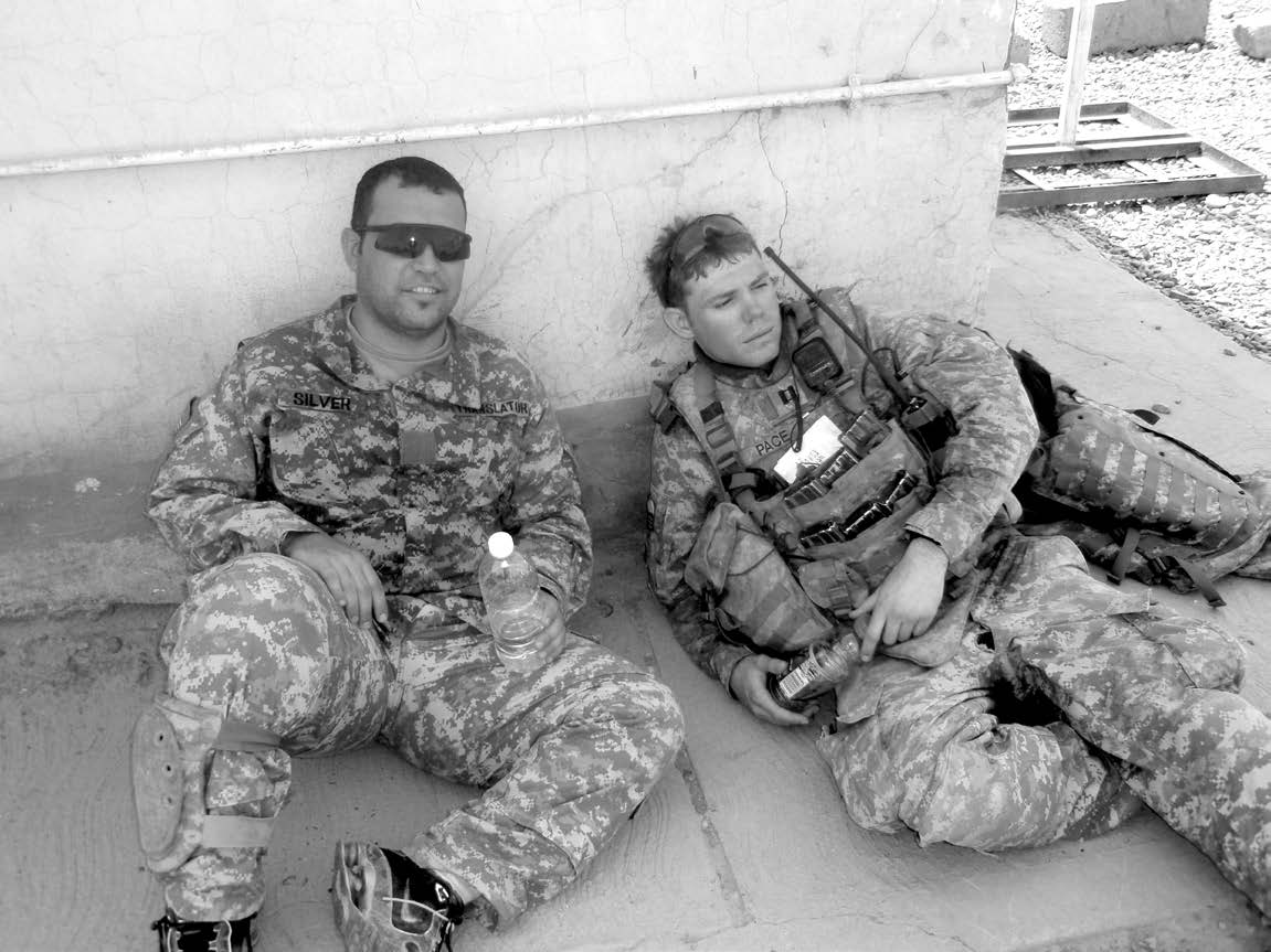 Captain Rick Pace (right) relaxing between missions with another soldier. Courtesy of Rick Pace.
