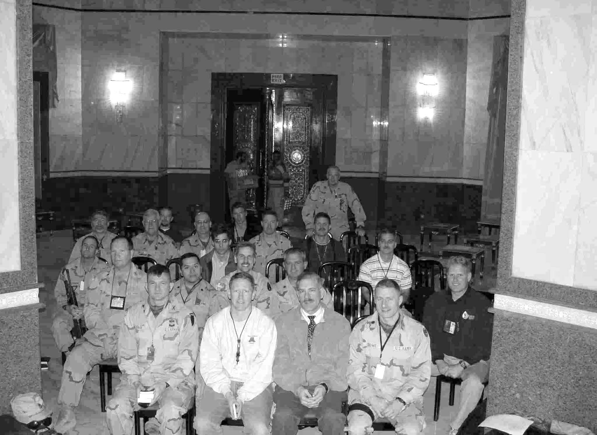 During December 2003, Church meetings in Baghdad, Iraq, were held in Saddam Hussein’s former presidential palace. Courtesy of Kevin R. Riedler (second from right on the front row).