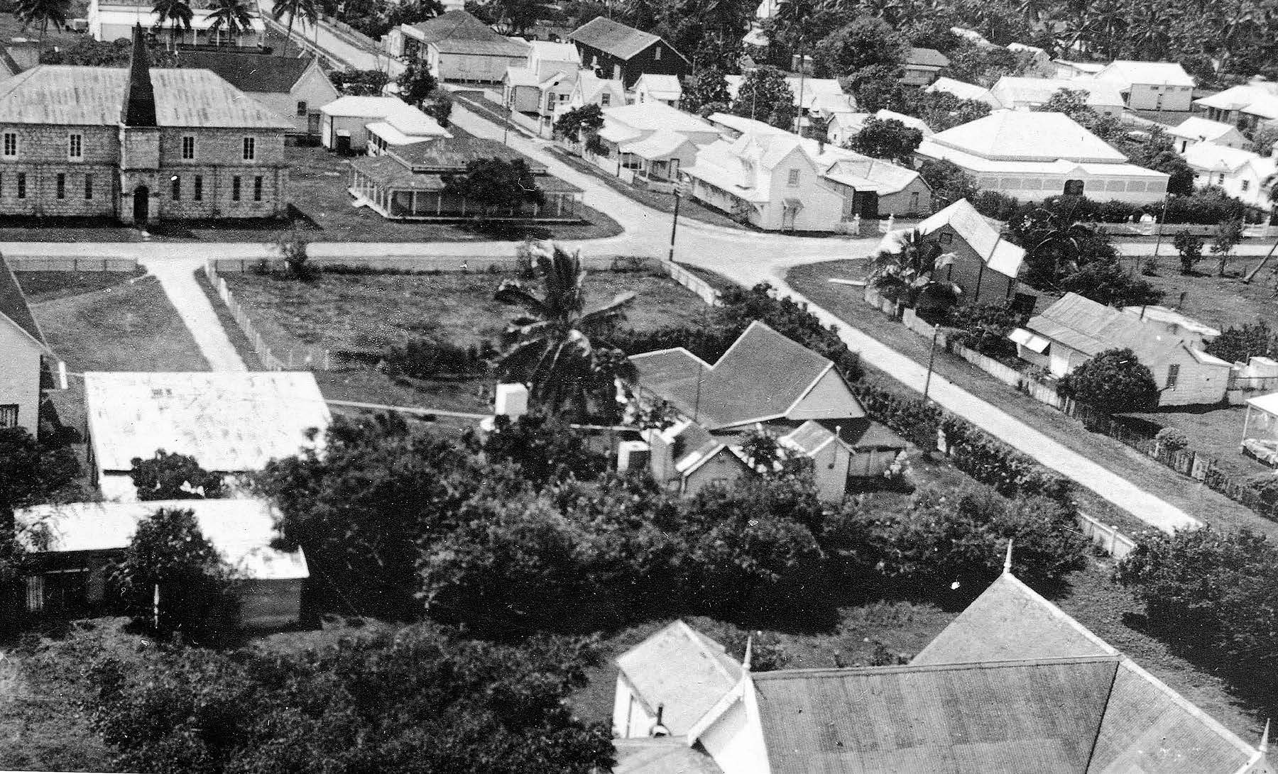 Downtown Nuku‘alofa late 1930s with Percival Building on top right corner of the intersection. Photo by August Hettig in Harris Vincent collection courtesy of Lorraine Morton Ashton.