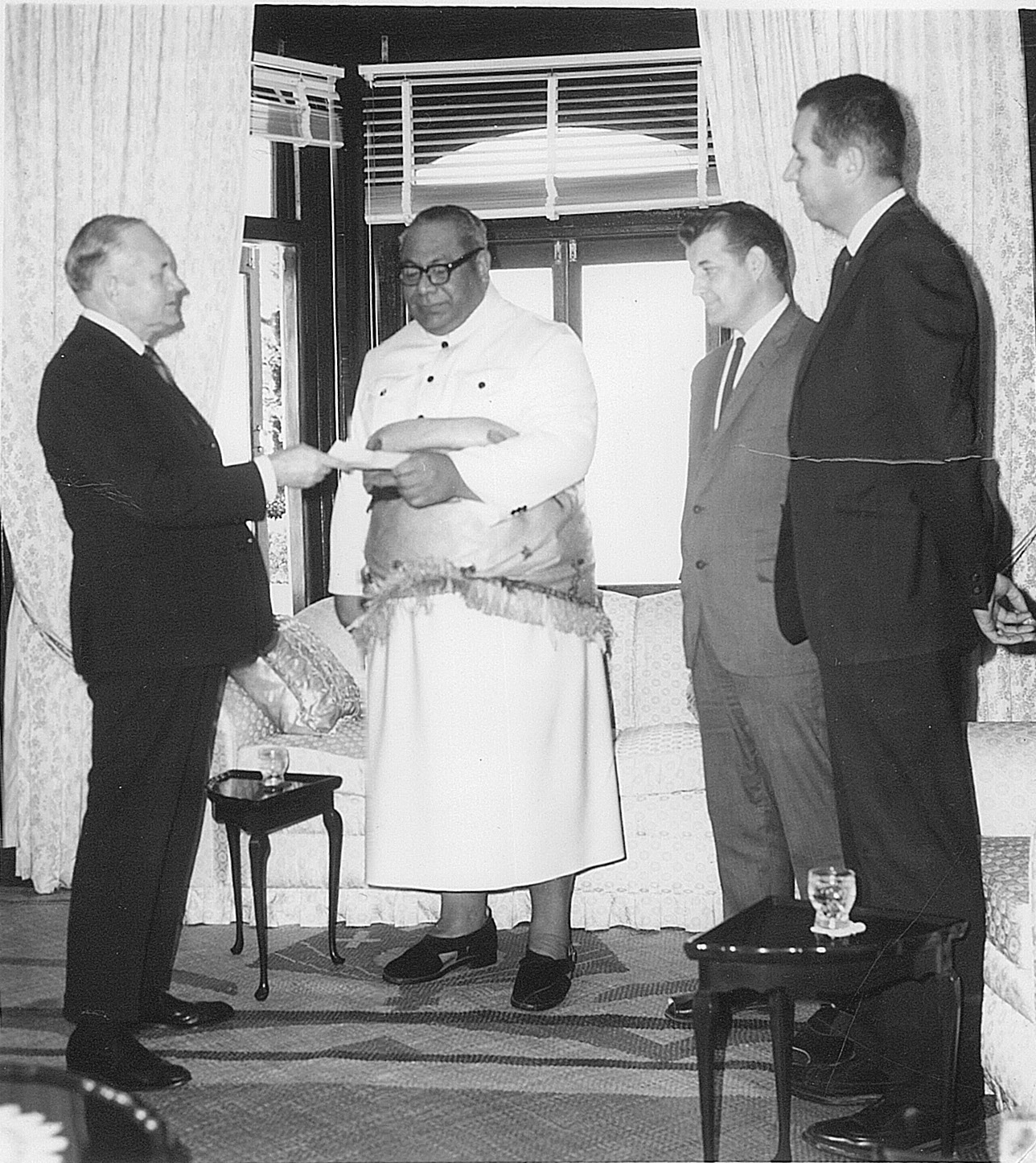 Elders Howard W. Hunter, John Groberg and President James Christensen visit with His Majesty King Taufa‘ahau Tupou IV. Courtesy of Jerry Dobson.