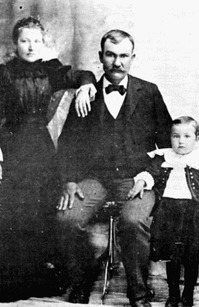 Margaret Cheney Brewer with husband Joseph Lewis Brewer and son Wilford.