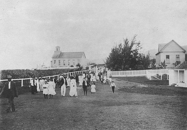 Saints departing the Lāʻie Chapel (named “I Hemolele”) after Sunday services. This chapel would be the site chosen and dedicated for the construction of a temple. Courtesy of Church History Library.