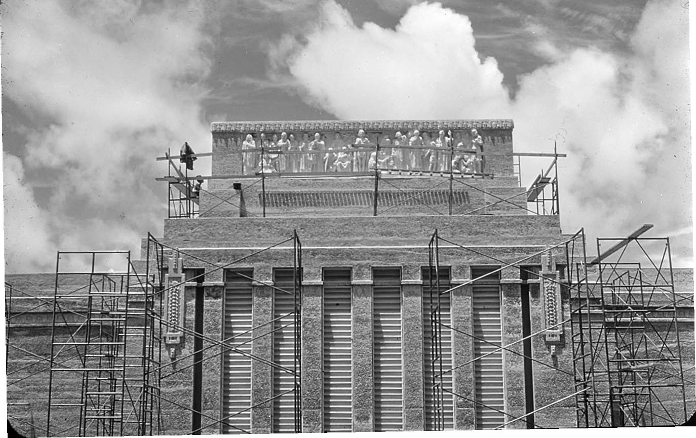 The friezes were hoisted into place and mounted around the cornice of the temple. Courtesy of Church History Library.