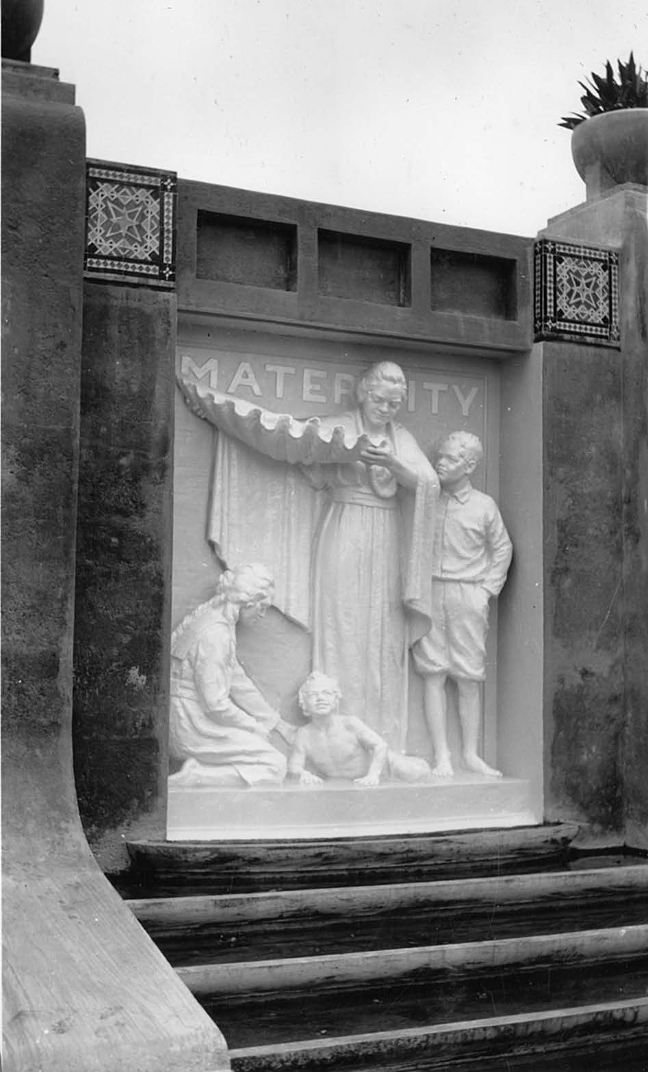 At the head of three pools is a bold relief panel designed and sculpted by Avard Fairbanks to honor motherhood. Courtesy of Church History Library.