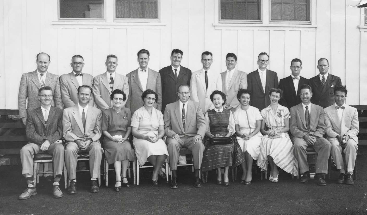 First faculty of the Church College of Hawaii. College president Reuben Law (front row center) felt the temple had an important role to play in meeting the lofty vision President David O. McKay set forth for the school. Courtesy of BYU–Hawaii Archives.