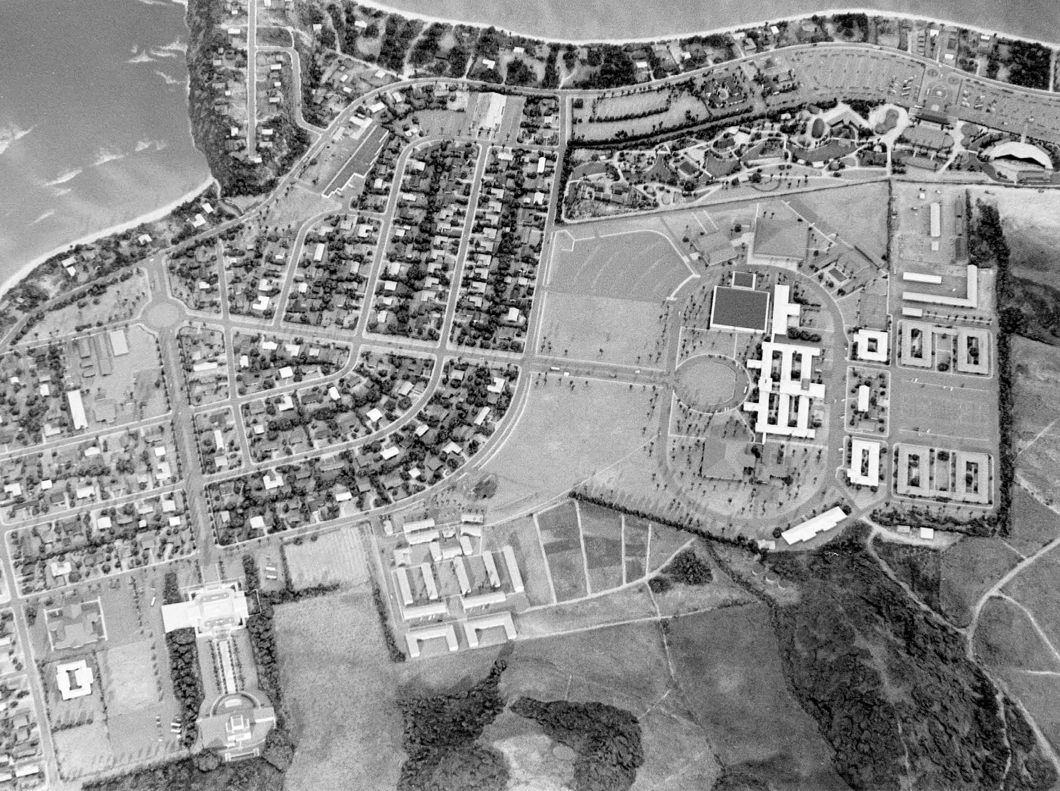 President Howard W. Hunter noted that the Hawaii Temple (lower left), Church College of Hawaii (middle right) and Polynesian Cultural Center (upper right) form a “triad of learning” that “has a significant place in the plan of the Lord to further the work of his kingdom.” Courtesy of BYU–Hawaii Archives.