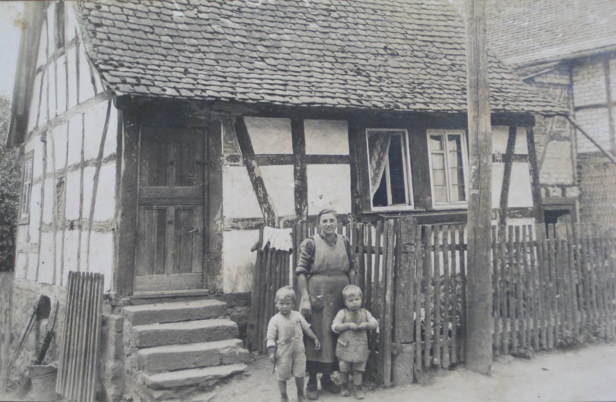 Family in front of a house
