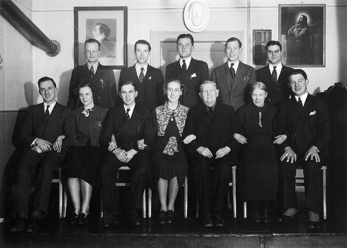 many adults sitting together