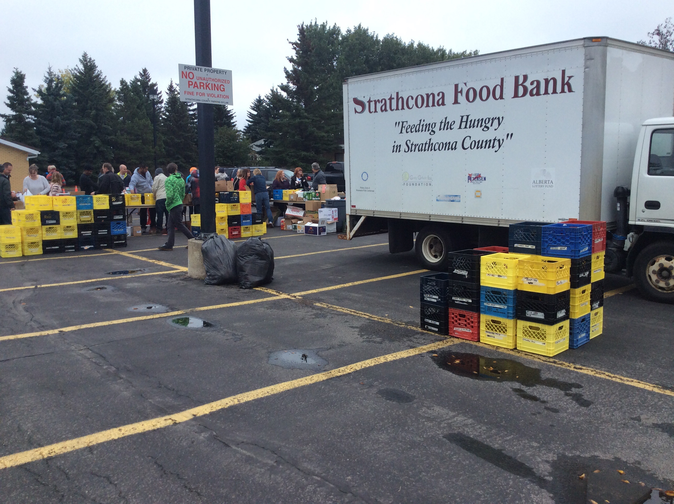 a truck with people helping out at a service project