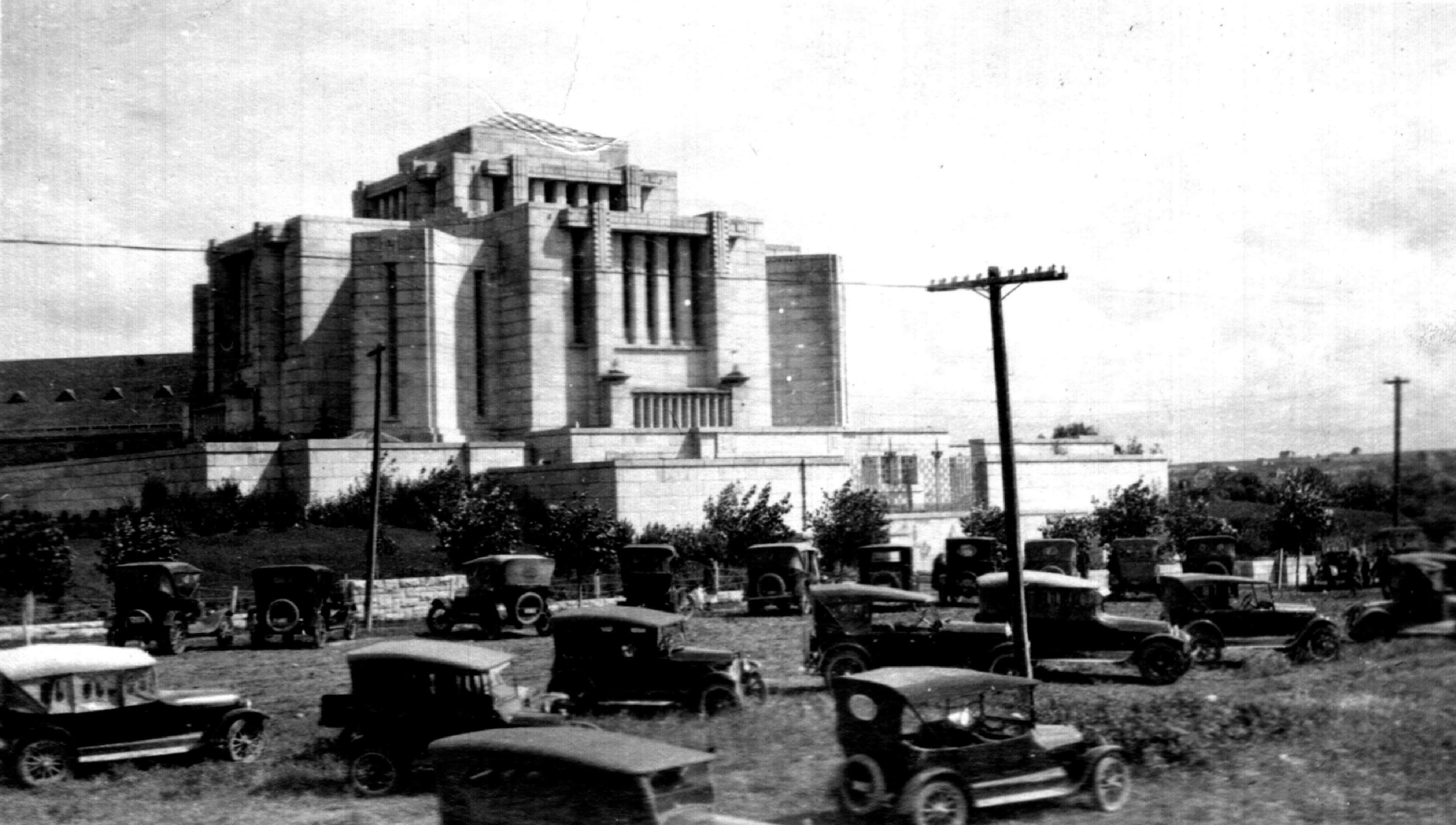 Cars parked outside the temple for the dedication
