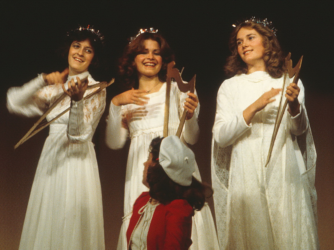 three girls with wings and harps