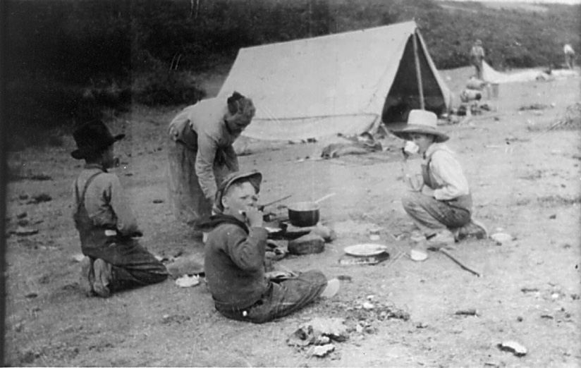 little boys at a tent