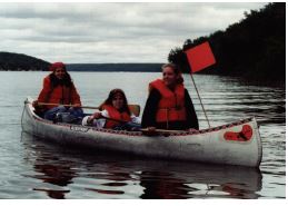 three girls in a canoe