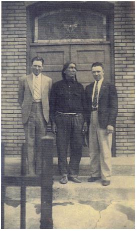 chief with two other men