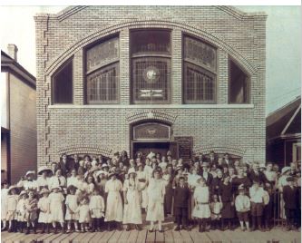 church building with members on the steps