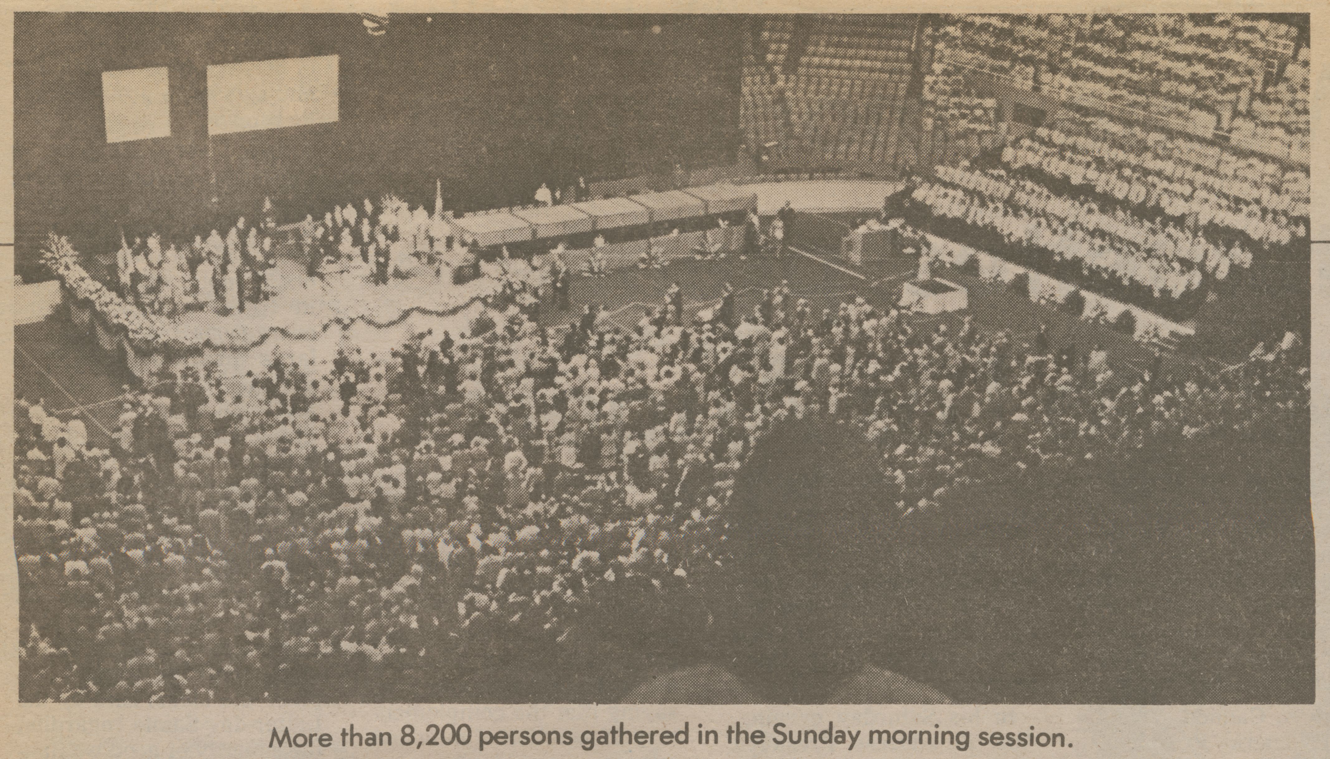 a large conference hall filled with people