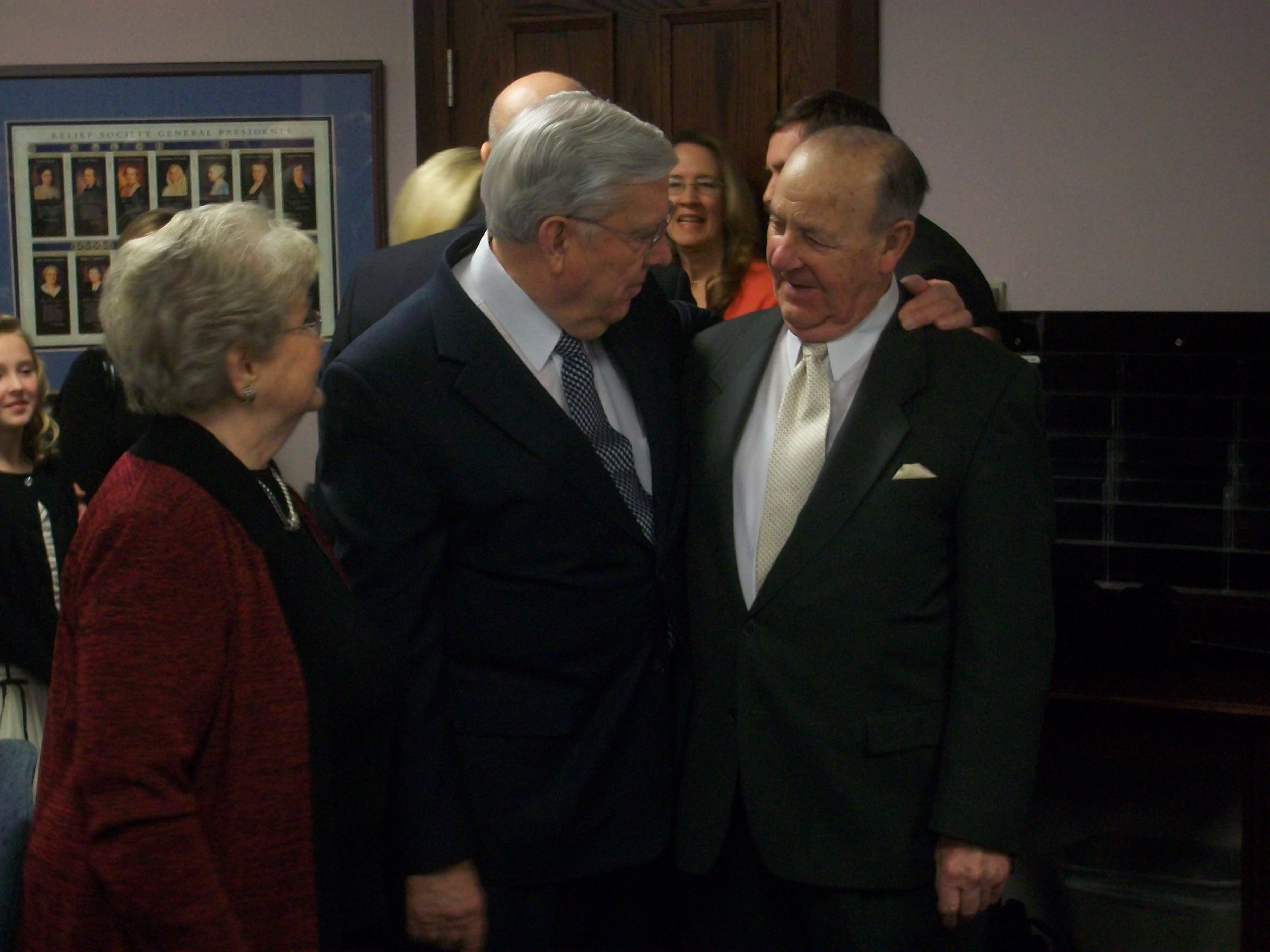 two people standing with Elder Ballard