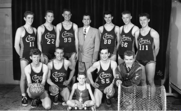 Basketball team with a trophy