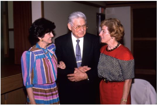 a man with two women