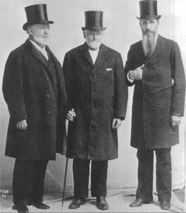 three men standing