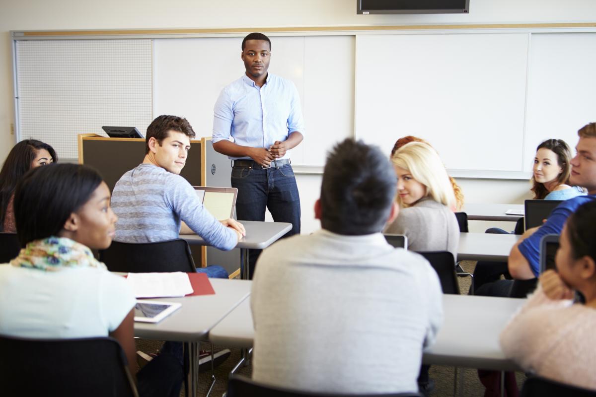 A man teaching in the classroom