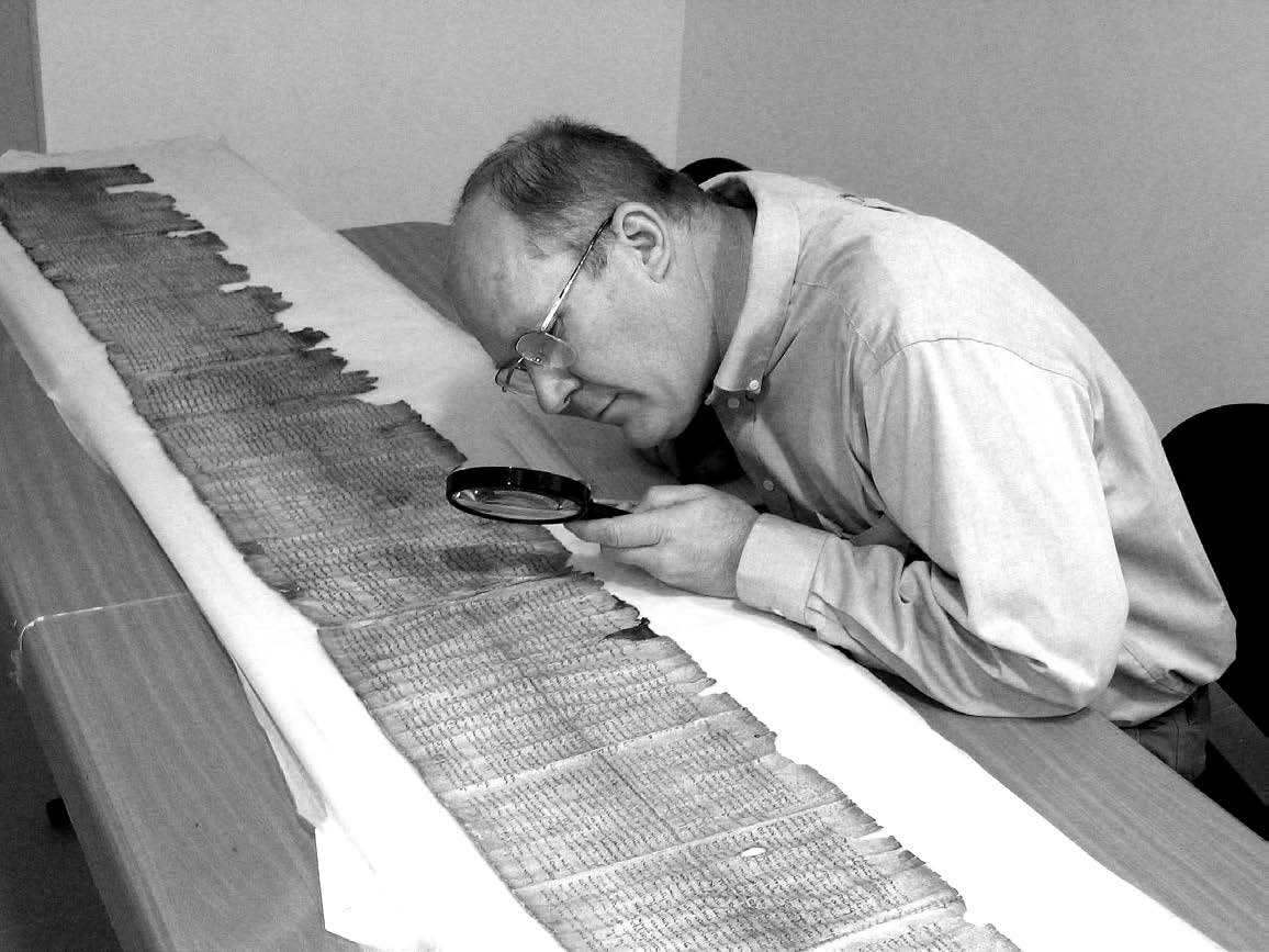Donald W. Parry studies the Great Isaiah Scroll