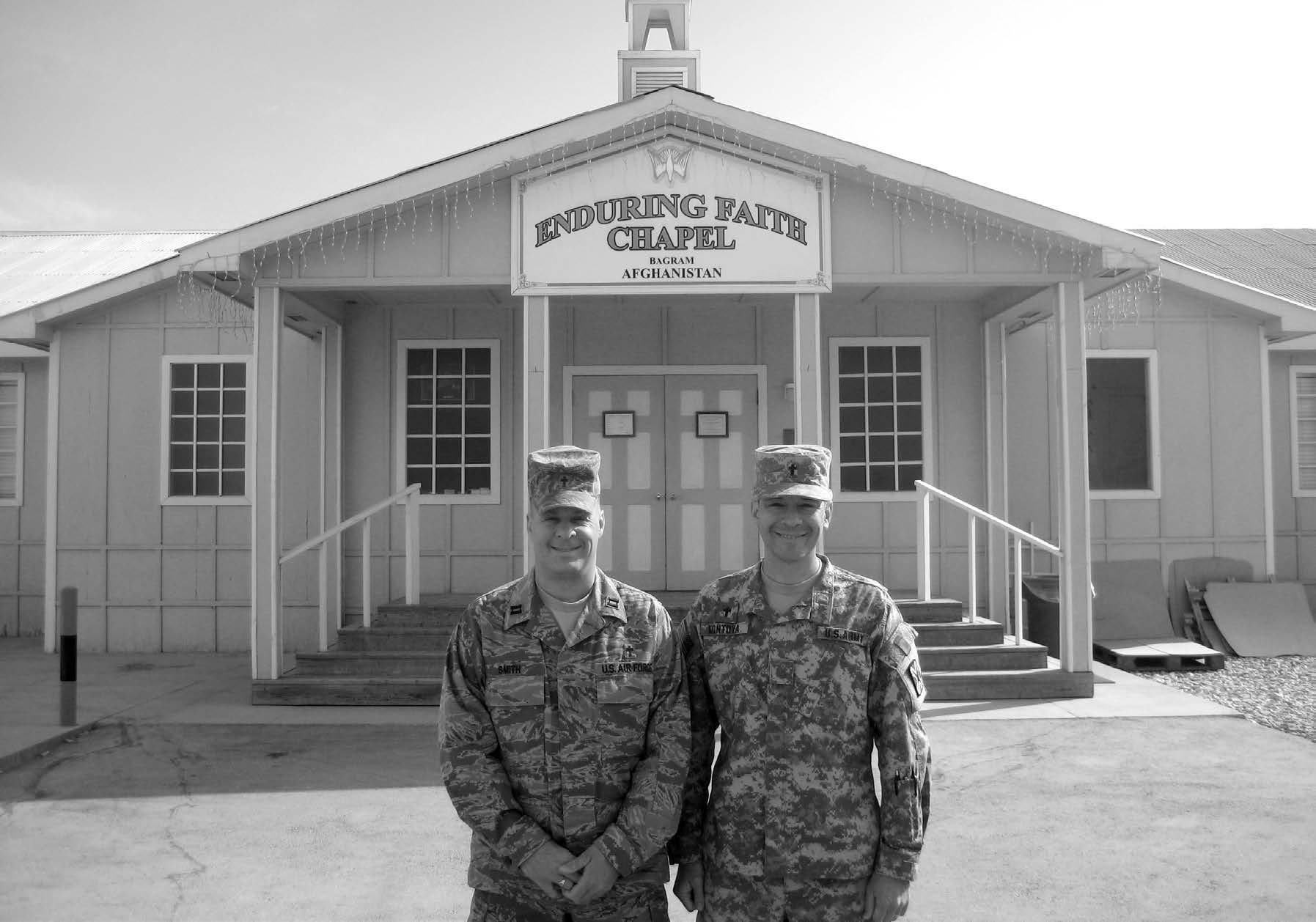 Latter-day Saint chaplains Smith and Montoya stand in front of the Enduring Faith Chapel at Bagram, Afghanistan. Courtesy of Eugene J. Wikle.