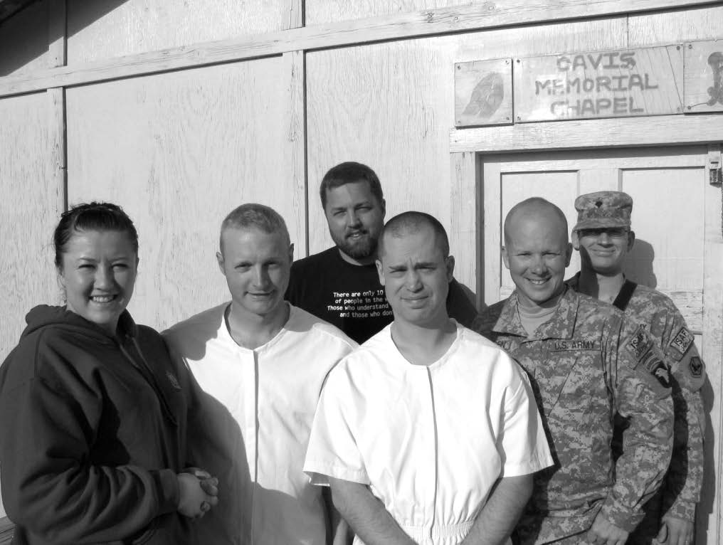 Baptism of Darrell Lewis at Forward Operating Base Sharana. Left to right: Gentry Jensen, Aaron Eagan, Richard Budge, Darrell Lewis, Mike Eliassen and Alaric Young. Courtesy of Eugene J. Wikle.