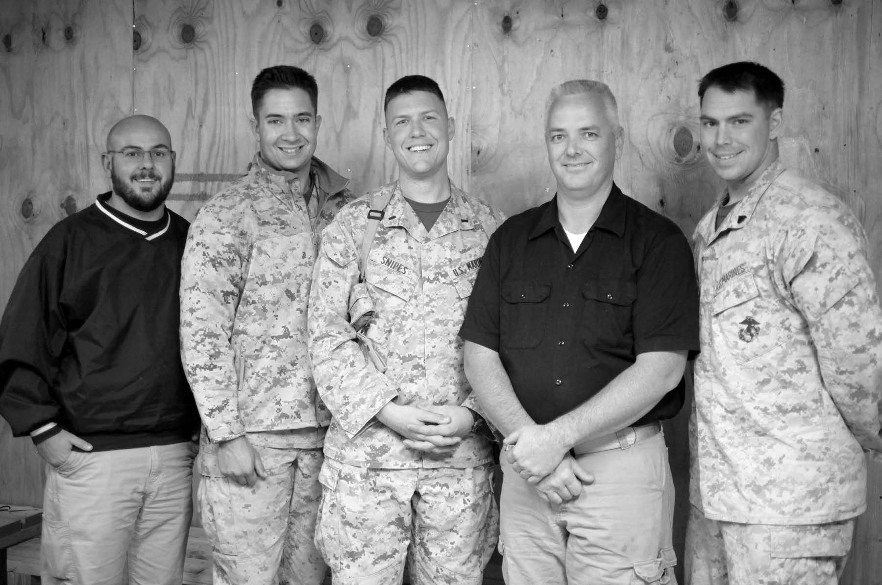Leatherneck Military Branch leadership in Helmand Province, Afghanistan, in December 2010. Camp Leatherneck was the main support base for 14,000 Marines serving in southern Afghanistan. Left to right: Dan Firsdon, elders quorum president; Kevin Smidt, first counselor, branch presidency; David Snipes, branch president; Brian Sheetz, second counselor, branch presidency; and Logan Riddle, branch clerk. Courtesy of Eugene J. Wikle.