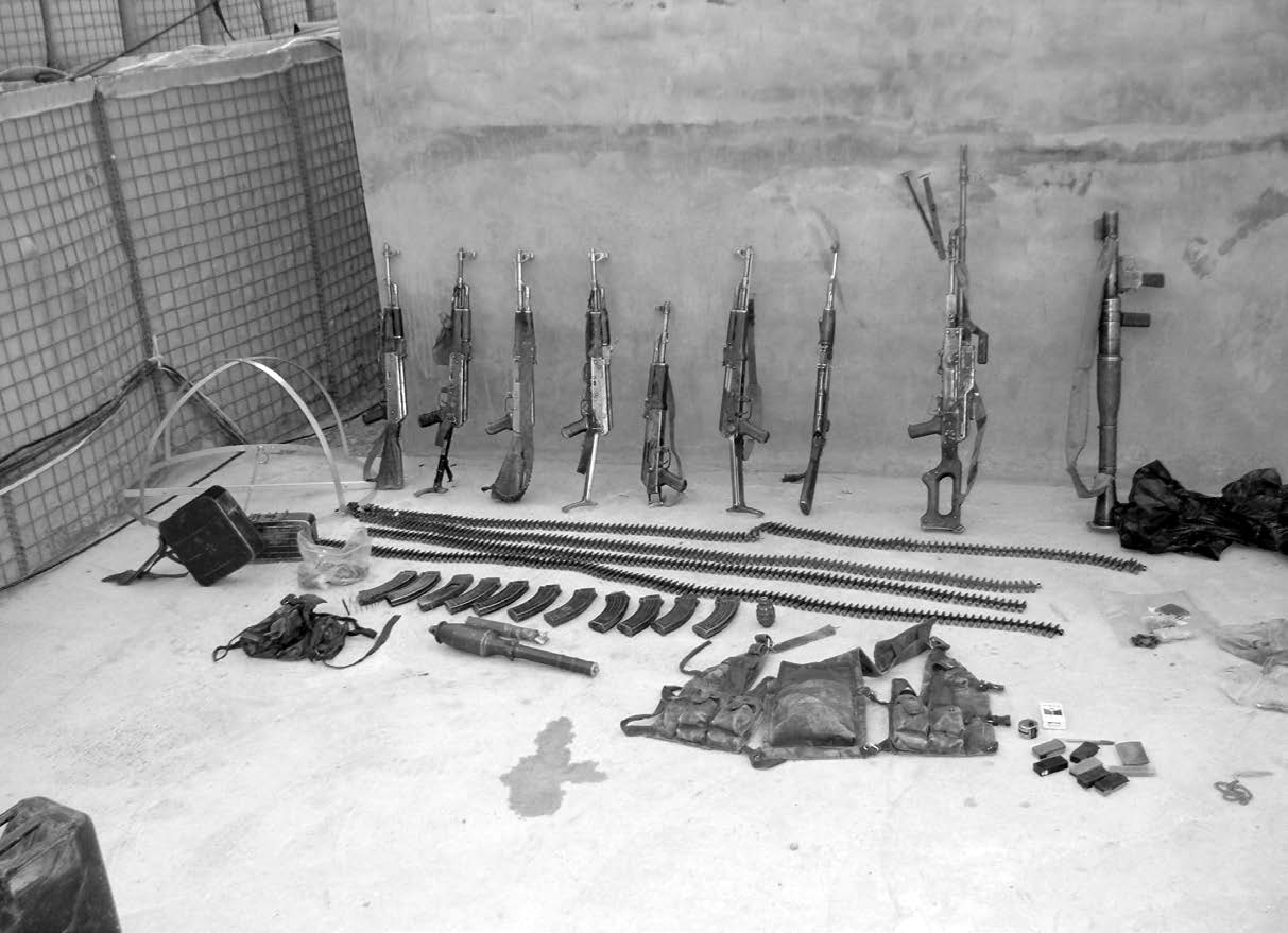 Enemy weapons and munitions Colby Jenkins’ soldiers discovered. He said, “We often found that despite having old weapons systems, the Taliban fighters kept their weapons in decent working condition. Fortunate for us, their marksmanship was not as good as ours.” Courtesy of Colby Jenkins.