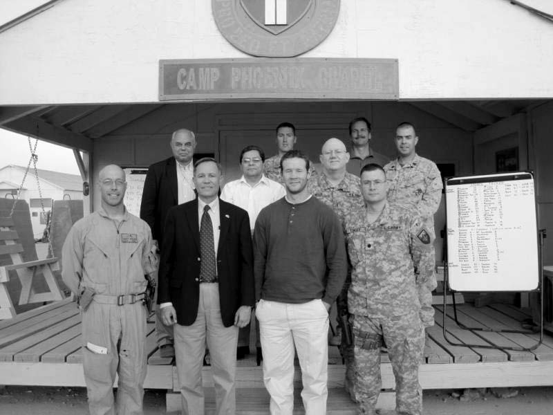 Church members at Camp Phoenix, which was later renamed Camp Qargha, were located in Kabul about six miles from the international airport. Left to right: first row—Harry McClure (USAF), Eugene J. Wikle (district president), Keaton Southwick, Mike Stacey (U.S. Army); second row: Winn Noyes (first counselor, district presidency), Frank Gomez (group leader), Bob Resch (U.S. Army); third row: Nathan Anderson, (USN), Timothy Hall, and Brian Grimm (USMC). Courtesy of Eugene J. Wikle.