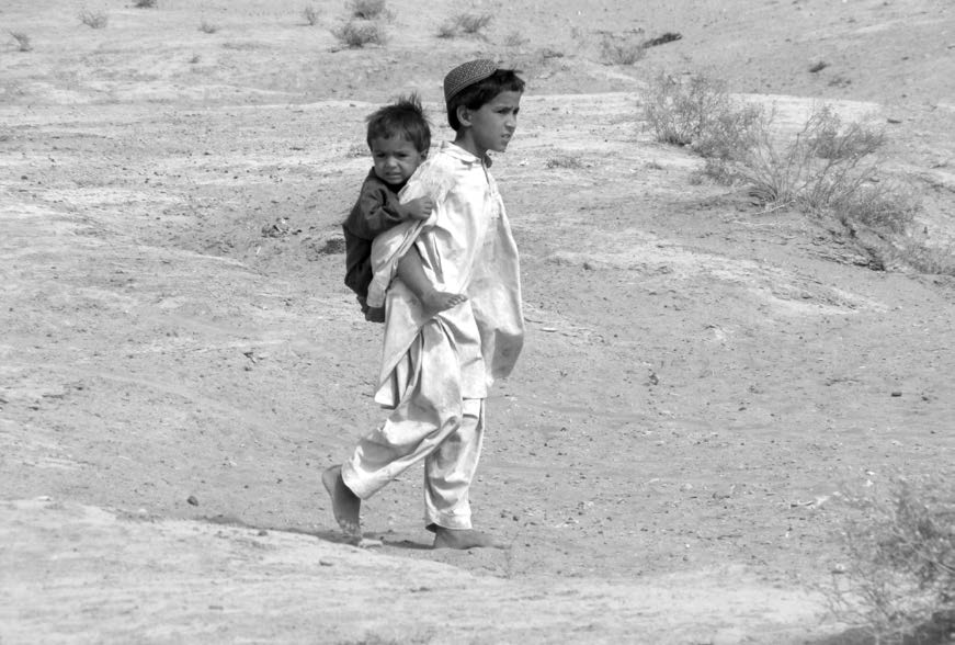 These photos show elements of everyday life in the Afghan countryside. Courtesy of J. Joseph DuWors.