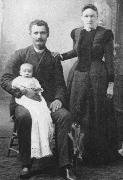 J. J. Shumway holding James with Nettie.