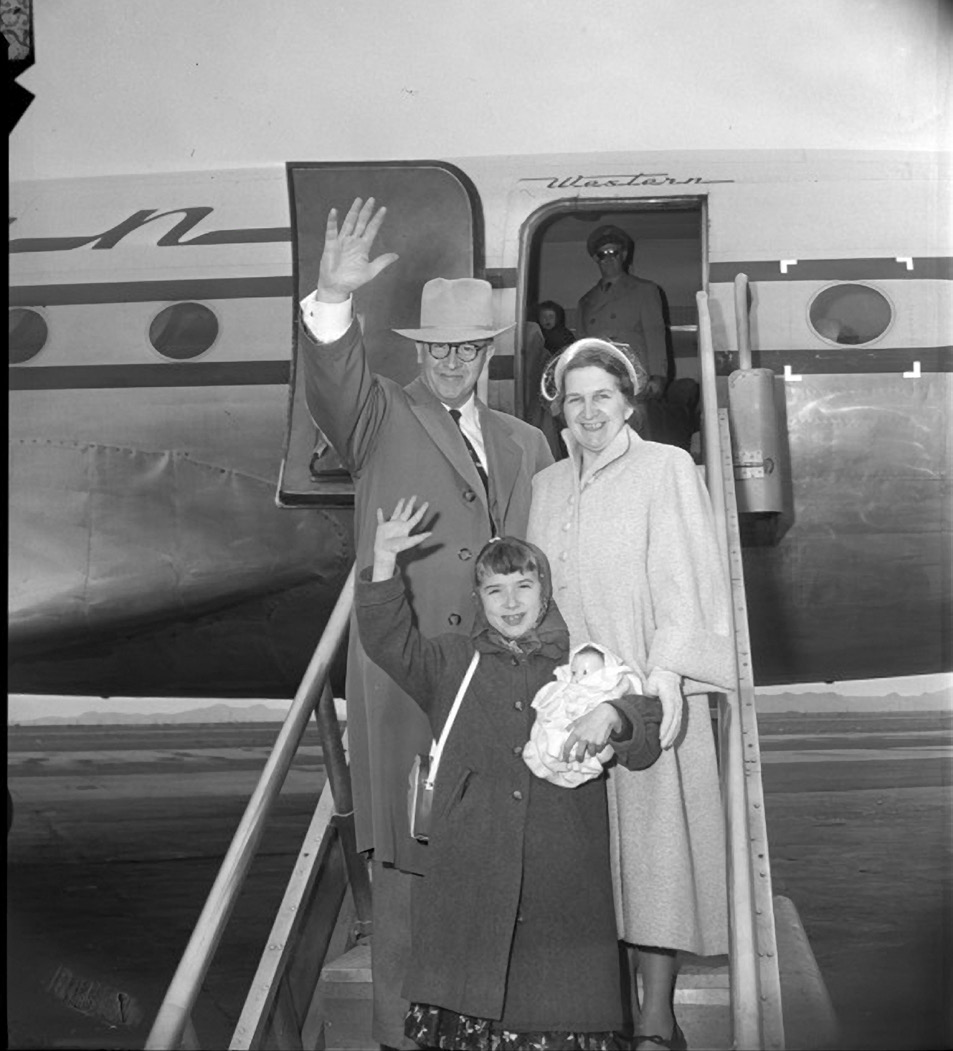 Secretary Ezra Taft Benson, his wife, Flora, and their youngest daughter, Flora Beth, traveling together in the spring of 1955. Library of Congress.