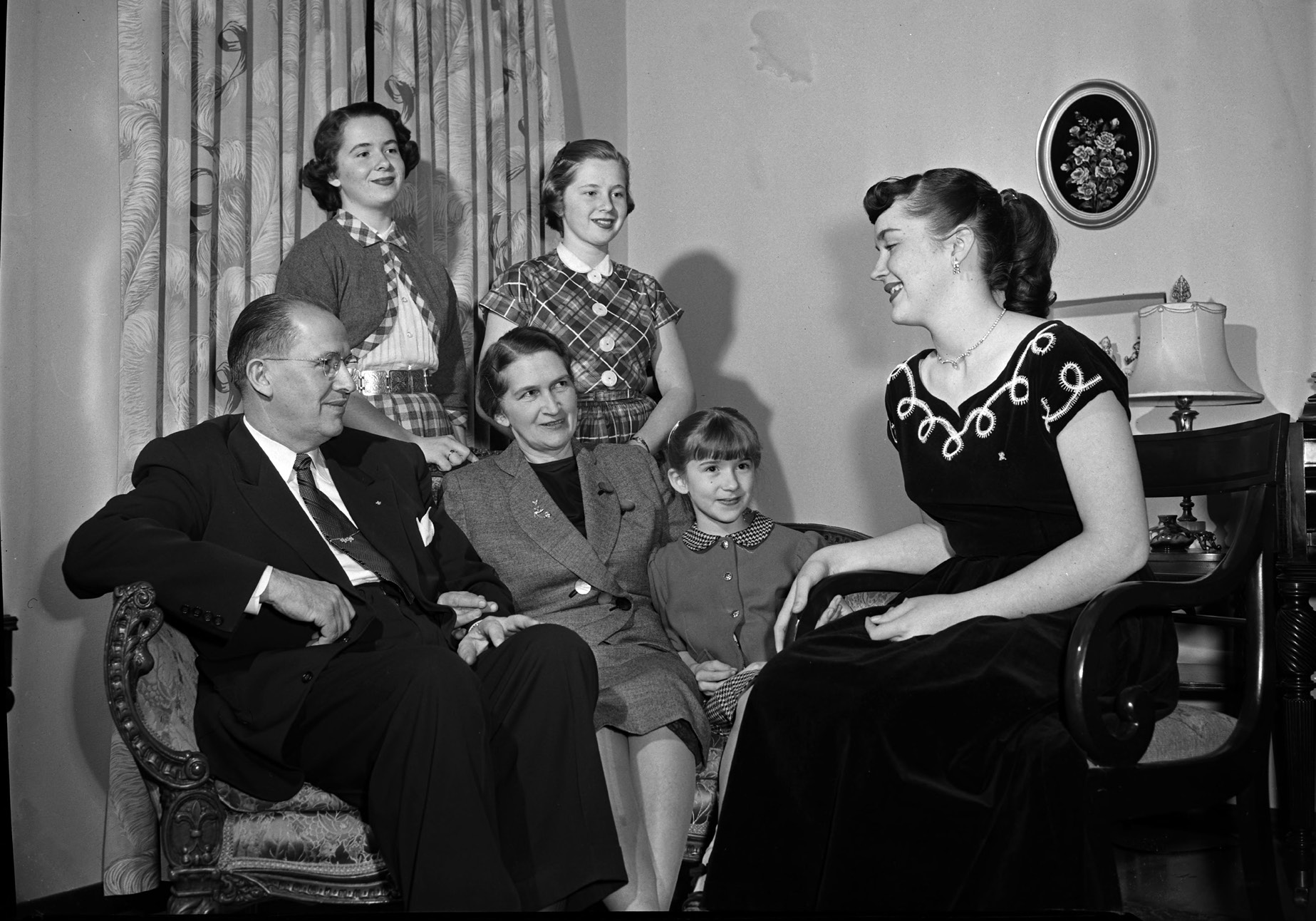 Newly appointed secretary of agriculture Ezra Taft Benson with his wife, Flora, and their four daughters, spending time together as a family, February 1953. Utah State Historical Society.