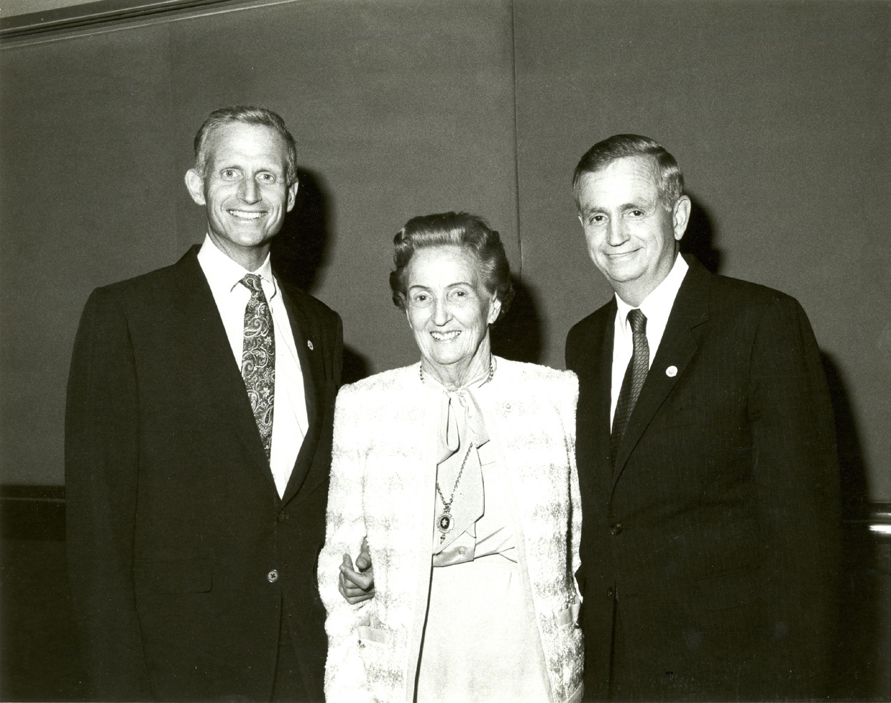 Dick, Allie, and Bill at the annual meeting following J.W.’s death, 1986.