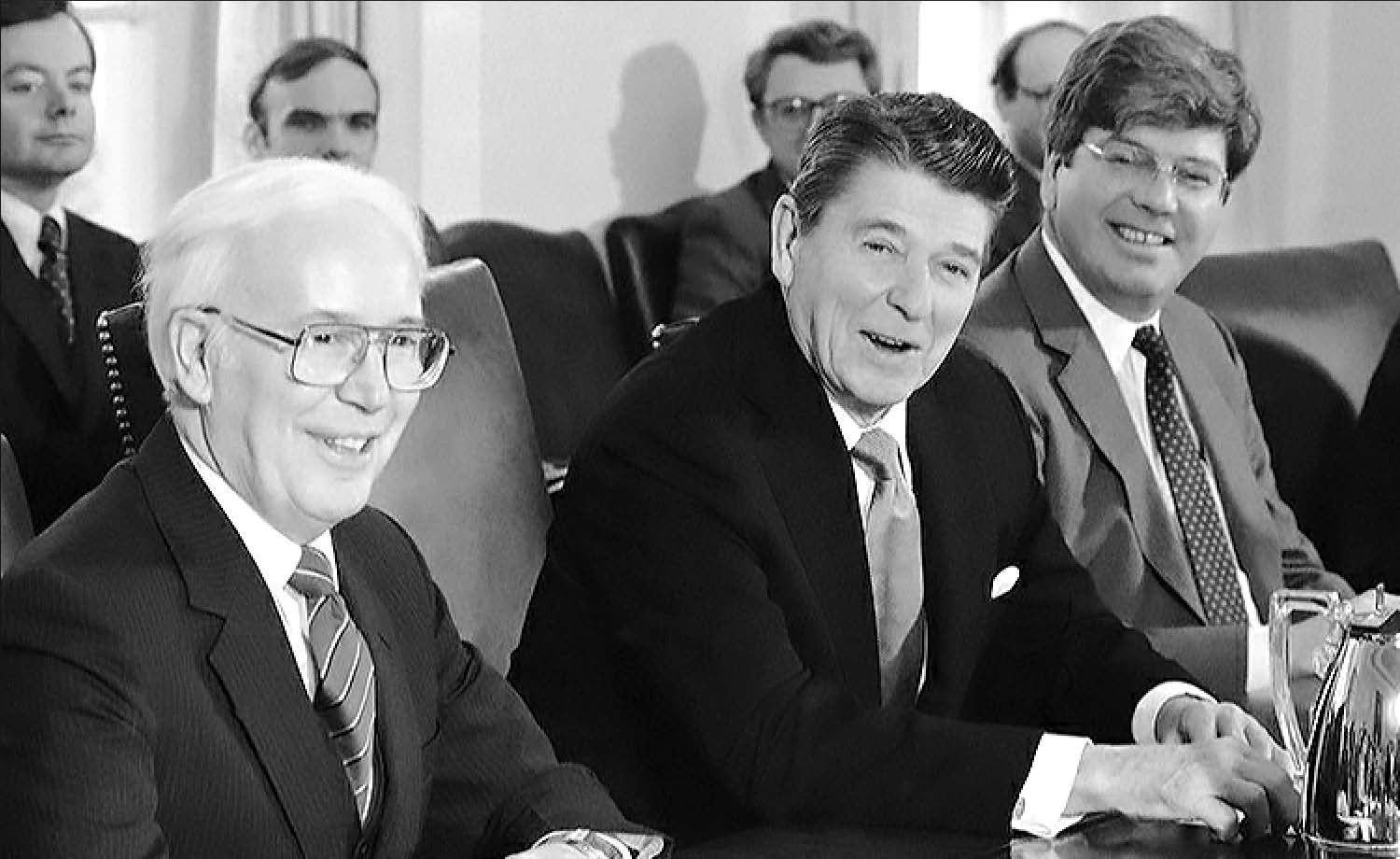 Cabinet meeting, 23 February 1984. T. H. Bell, President Reagan, John A. Svahn (director, White House Office of Policy Development). Associated Press.