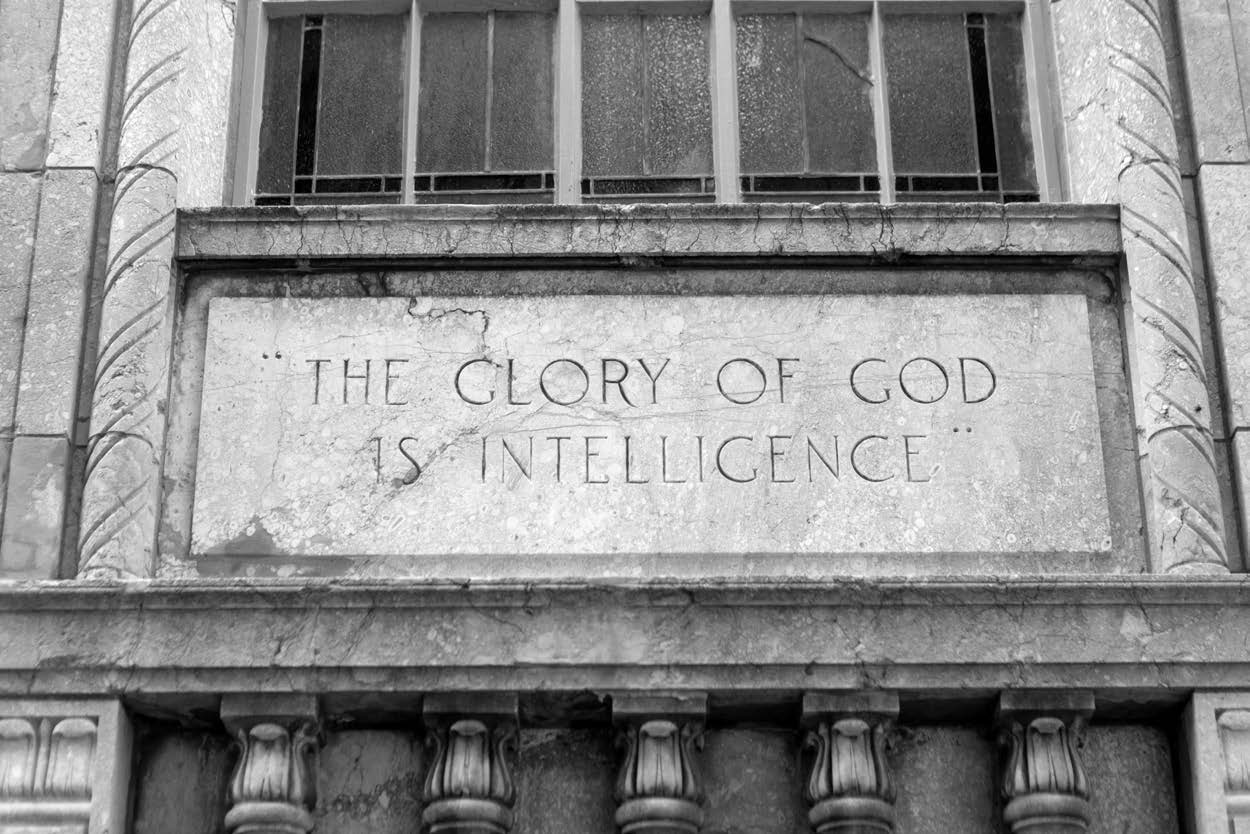 Doctrine and Covenants 93:36 carved on an exterior wall. Photo by Richard J. Crookston.