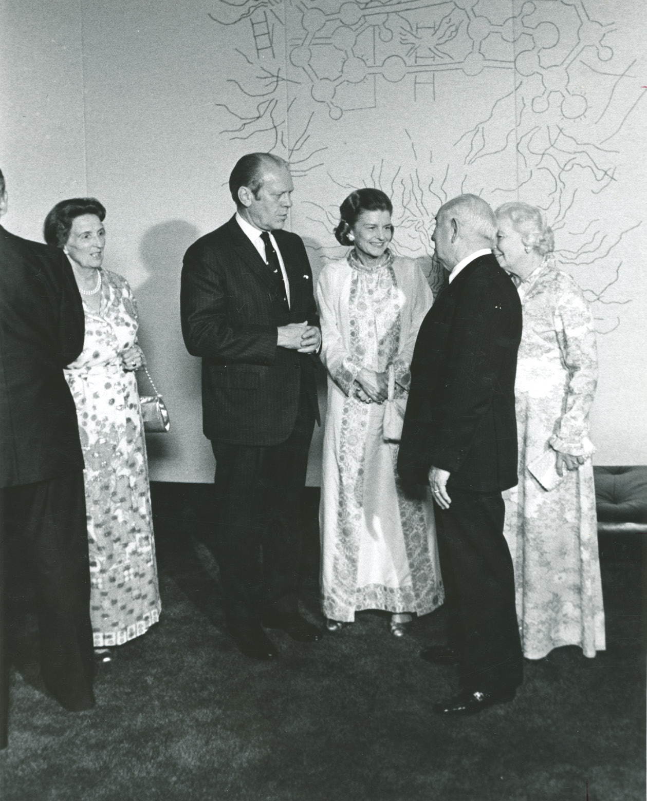 President Gerald Ford and First Lady Betty Ford talk with President Spencer W. Kimball and Sister Camilla Kimball at the Tabernacle Choir concert held in the John F. Kennedy Center for the Performing Arts in conjunction with the dedication of the Washington D.C. Temple and open house. Kimball–Ford Photos, Church History Library.