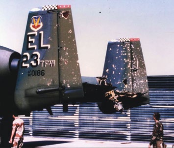 Damaged tail section of Dave Sawyer’s A-10 aircraft after being struck by an Iraqi rocket. Courtesy of Jeanne Sawyer.