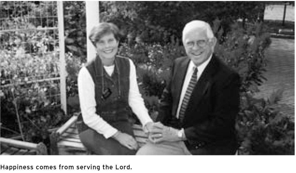 Elder and Sister Griffiths holding hands