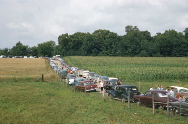 photo of cars on the road to the sacred grove