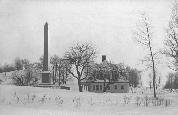 photo of the monument and cottage on the joseph smith trip in winter