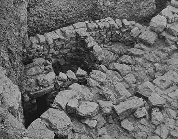 photo of a portion of the broad wall in Jerusalem that was built over some houses