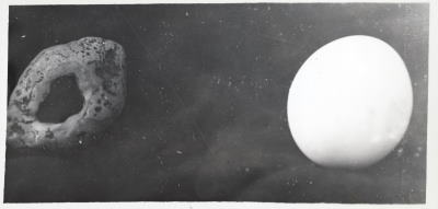 Green seer stone next to an egg