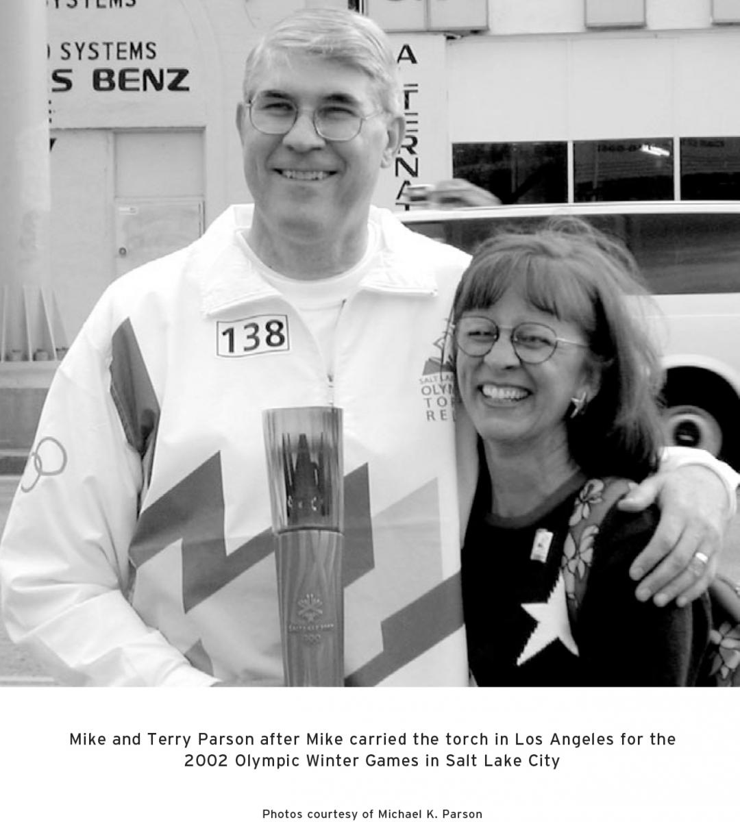 Mike and terry Parson with the olympic torch