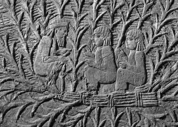 assyrian relief of man with two wives