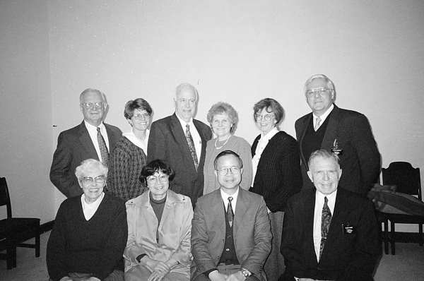 photo of elder tai with elders and sisters at a zone conference, 1994